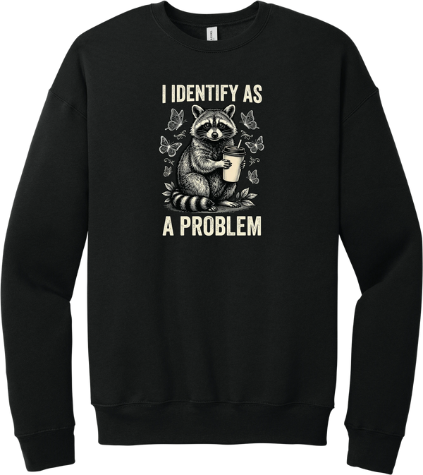 I Identify as a Problem crewneck sweatshirt in Black, featuring a raccoon holding a coffee cup surrounded by butterflies with I identify as a problem