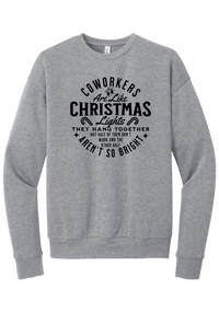 Coworkers Are Like Christmas Lights crewneck sweatshirt in Athletic Heather, featuring bold black type reading Coworkers Are Like Christmas Lights, they hang together but half of them don't work and the other half aren't so bright