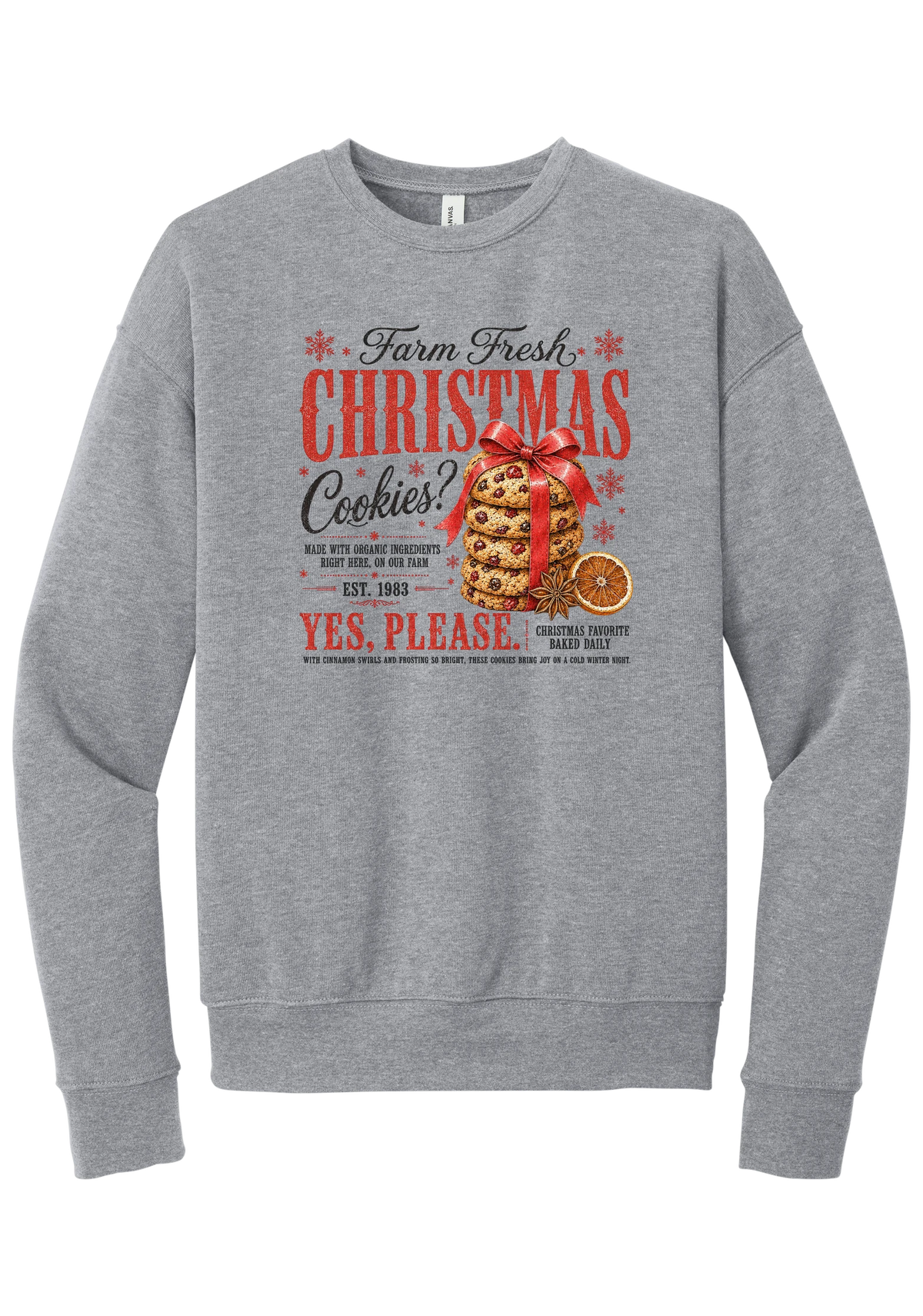 Farm Fresh Christmas Cookies crewneck sweatshirt in Athletic Heather, featuring a vintage farmhouse bakery sign with a stack of Christmas cookies tied in a red bow, a dried orange slice, and red and black lettering