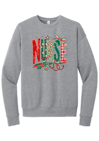 Holiday Nurse Stethoscope crewneck sweatshirt in Athletic Heather, featuring patterned NURSE letters in red and green argyle, leopard, and gingham with a striped bow, holly, and a red heart stethoscope