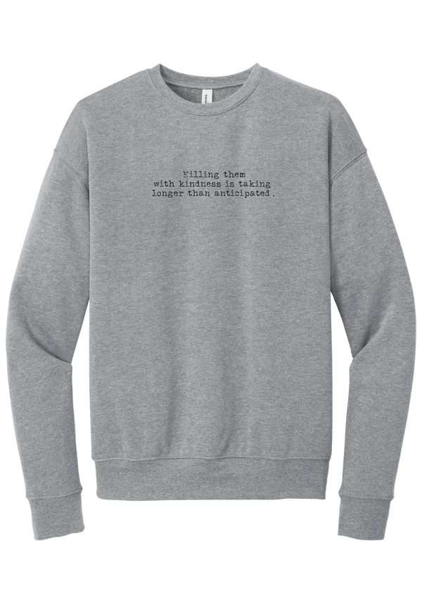 Killing Them With Kindness crewneck sweatshirt in Athletic Heather, featuring Killing them with kindness is taking longer than anticipated in distressed black typewriter letters