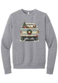 Christmas Pickup Truck with Dog crewneck sweatshirt in Athletic Heather, featuring a vintage pickup truck with a Christmas tree, wrapped gifts, a tailgate wreath, and a dog in a Santa hat