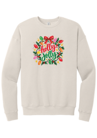 Holly Jolly Christmas Lights crewneck sweatshirt in Heather Dust, featuring hand-lettered holly jolly script framed by vintage Christmas bulb lights, pine, holly berries, and a red bow