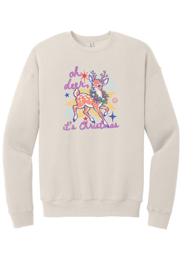 Oh Deer Retro crewneck sweatshirt in Heather Dust, featuring a retro spotted fawn with a holly wreath, pastel stars, and Oh Deer It's Christmas script