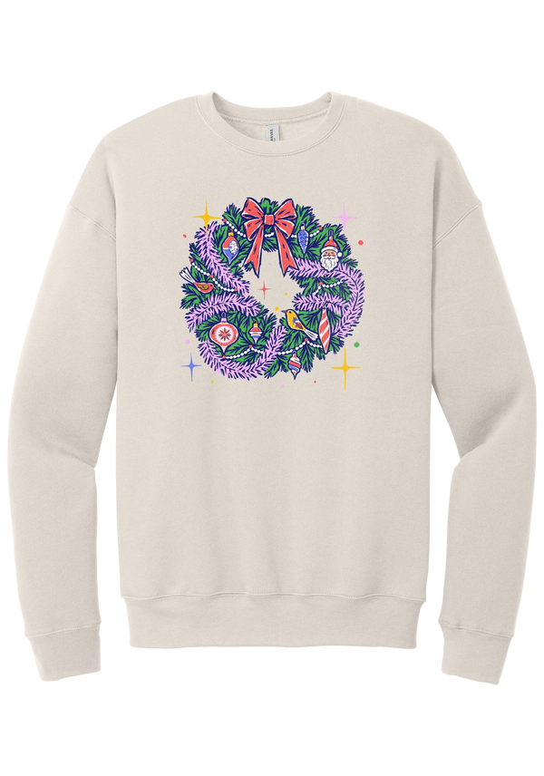 Retro Wreath crewneck sweatshirt in Heather Dust, featuring a retro tinsel Christmas wreath with vintage ornaments and a red bow