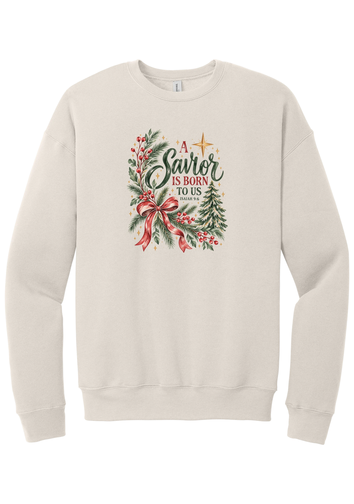 A Savior Is Born To Us crewneck sweatshirt in Heather Dust, featuring watercolor evergreen and holly with a red ribbon bow, the words A Savior is born to us, and Isaiah 9:6