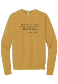 Amelia Earhart Tenacity Quote crewneck sweatshirt in Heather Mustard, featuring The most difficult thing is the decision to act the rest is merely tenacity in distressed black typewriter letters