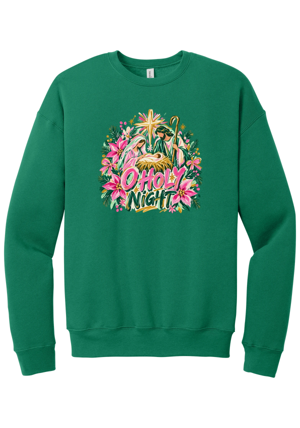 Artful O Holy Night crewneck sweatshirt in Kelly Green, featuring a painted nativity under the star of Bethlehem with O Holy Night lettering framed by pink poinsettias and evergreen