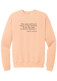 Amelia Earhart Tenacity Quote crewneck sweatshirt in Peach, featuring The most difficult thing is the decision to act the rest is merely tenacity in distressed black typewriter letters