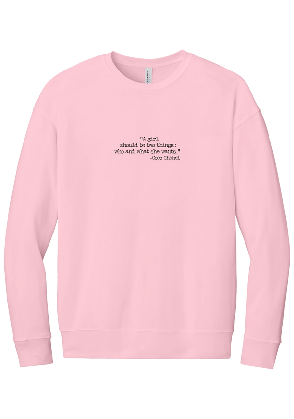 Coco Chanel Who and What Quote crewneck sweatshirt in Pink, featuring A girl should be two things who and what she wants in distressed black typewriter letters