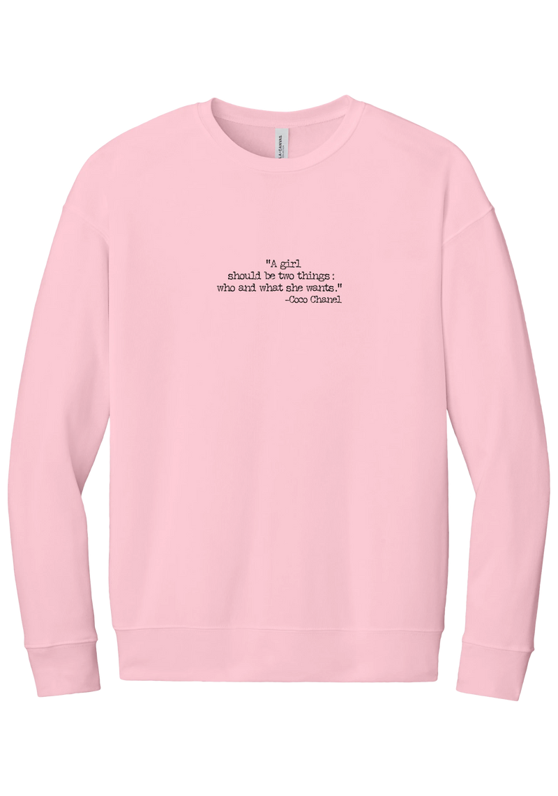 Coco Chanel Who and What Quote crewneck sweatshirt in Pink, featuring A girl should be two things who and what she wants in distressed black typewriter letters