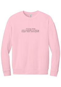 Killing Them With Kindness crewneck sweatshirt in Pink, featuring Killing them with kindness is taking longer than anticipated in distressed black typewriter letters