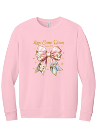 Love Came Down Nativity Bow crewneck sweatshirt in Pink, featuring a blush satin bow with painted nativity scenes under gold Love Came Down script and Luke 2:11