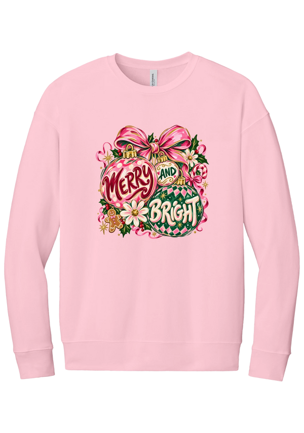 Merry and Bright Ornaments crewneck sweatshirt in Pink, featuring hand-painted pink and green ornaments reading Merry and Bright with a pink bow, holly, daisies, a candy cane, and a gingerbread man
