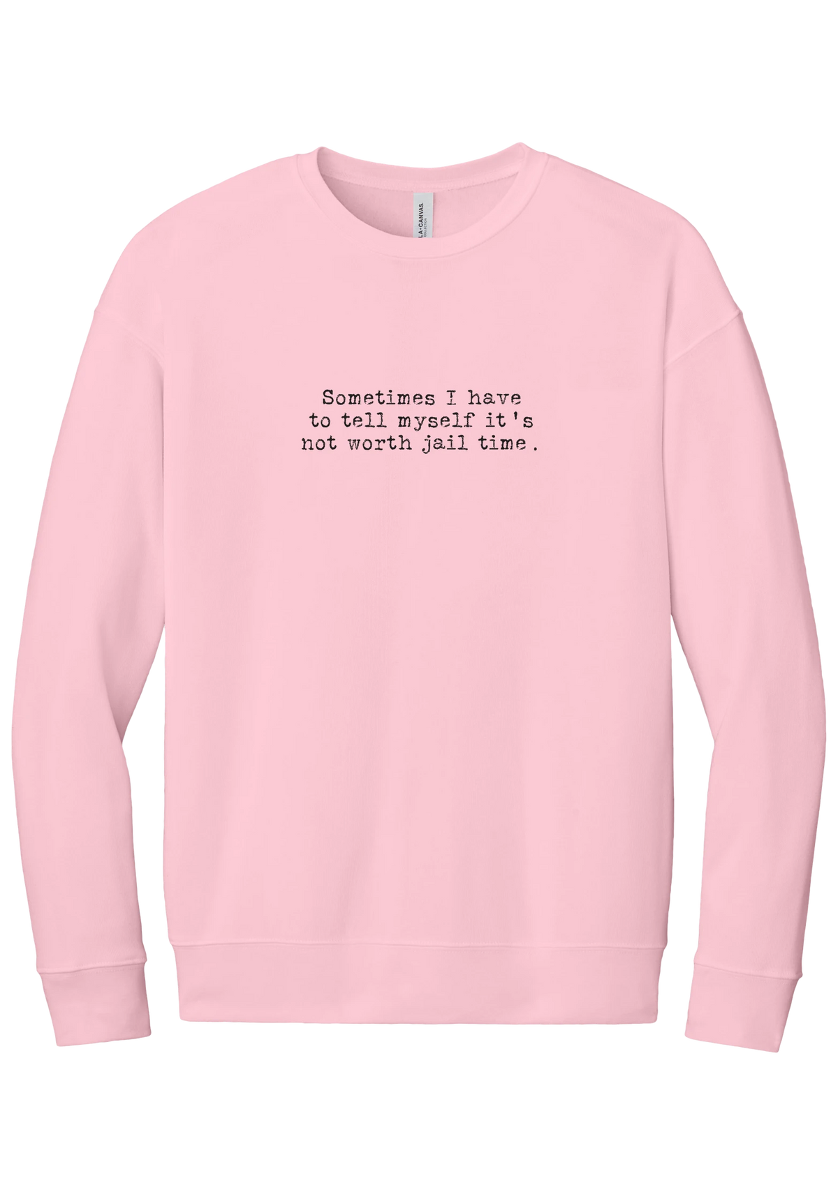 Not Worth Jail Time crewneck sweatshirt in Pink, featuring Sometimes I have to tell myself it's not worth jail time in distressed black typewriter letters