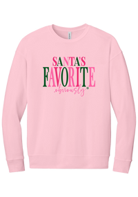 Santa's Favorite, Obviously crewneck sweatshirt in Pink, featuring SANTA'S FAVORITE in pink and green serif lettering with a pink script obviously and a green snowflake