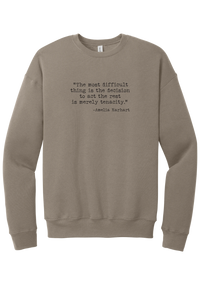 Amelia Earhart Tenacity Quote crewneck sweatshirt in Tan, featuring The most difficult thing is the decision to act the rest is merely tenacity in distressed black typewriter letters