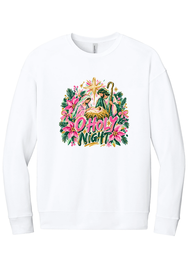 Artful O Holy Night crewneck sweatshirt in White, featuring a painted nativity under the star of Bethlehem with O Holy Night lettering framed by pink poinsettias and evergreen