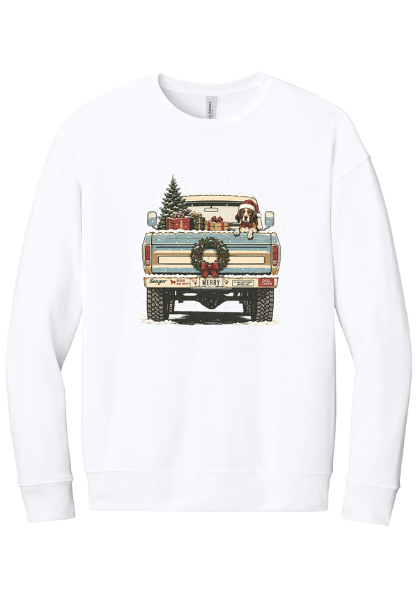 Christmas Pickup Truck with Dog crewneck sweatshirt in White, featuring a vintage pickup truck with a Christmas tree, wrapped gifts, a tailgate wreath, and a dog in a Santa hat
