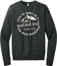 Mustard Seed Faith crewneck sweatshirt in Dark Grey Heather, featuring a circle badge of mountains and a cross with Faith as Small as a Mustard Seed Can Move Mountains lettering and Matthew 17:20