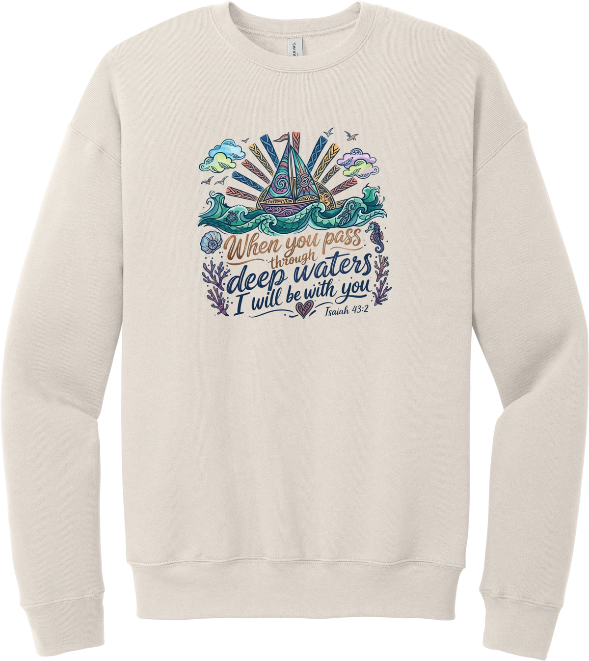 Deep Waters Folk Art crewneck sweatshirt in Heather Dust, featuring a folk art sailboat on swirling waves with a sunburst, seashells, and a seahorse above When You Pass Through Deep Waters I Will Be With You lettering and Isaiah 43:2