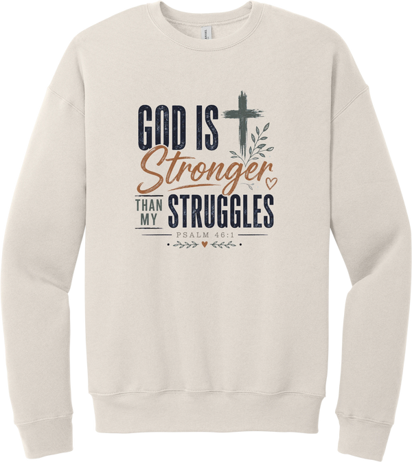 God Is Stronger crewneck sweatshirt in Heather Dust, featuring God Is Stronger Than My Struggles lettering with a cross and Psalm 46:1