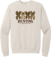 Hunting Is My Favorite Season crewneck sweatshirt in Heather Dust, featuring four camo coquette bows with antlers, acorns, and deer above Hunting Is My Favorite Season lettering