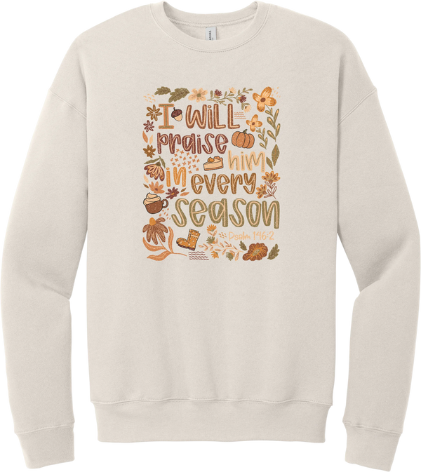 Praise Him Wildflower crewneck sweatshirt in Heather Dust, featuring I Will Praise Him in Every Season in hand lettering surrounded by fall wildflowers, pumpkins, a latte, boots, and Psalm 146:2