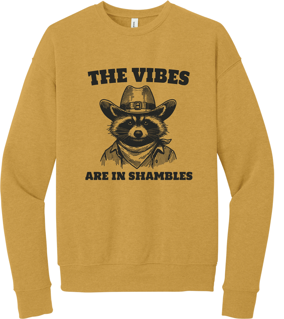 The Vibes Are in Shambles crewneck sweatshirt in Heather Mustard, featuring a cowboy raccoon in a bandana with The vibes are in shambles
