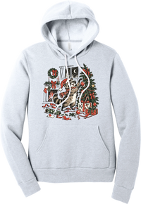 Raccoon Christmas hoodie in Ash, featuring a vintage-style raccoon in a Santa hat and plaid scarf decorating a Christmas tree by the fireplace with ribbon and gifts scattered around