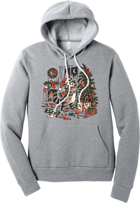 Raccoon Christmas hoodie in Athletic Heather, featuring a vintage-style raccoon in a Santa hat and plaid scarf decorating a Christmas tree by the fireplace with ribbon and gifts scattered around