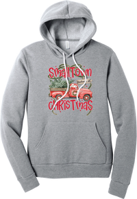 Personalized Small Town Christmas hoodie in Athletic Heather, featuring Santa in a vintage red pickup truck hauling a Christmas tree past a personalized town road sign, with red Small Town Christmas lettering