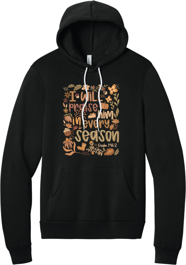 Praise Him Wildflower hoodie in Black, featuring I Will Praise Him in Every Season in hand lettering surrounded by fall wildflowers, pumpkins, a latte, boots, and Psalm 146:2