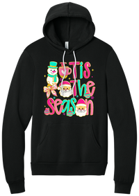 Tis the Season Snowman hoodie in Black, featuring pink and teal TIS THE SEASON letters with a snowman, a cocoa mug, and Santas