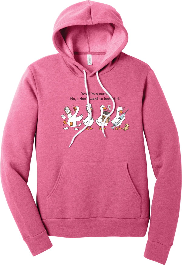 Yes I'm a Nurse Goose hoodie in Heather Charity Pink, featuring four nurse geese with a clipboard, stethoscope, coffee cup, and syringe under Yes, I'm a nurse. No, I don't want to look at it.