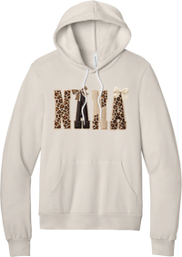 Grandma Leopard Applique hoodie in Heather Dust, featuring NANA spelled out in leopard, cream, and chocolate patches with a scalloped stitched applique look and two bows