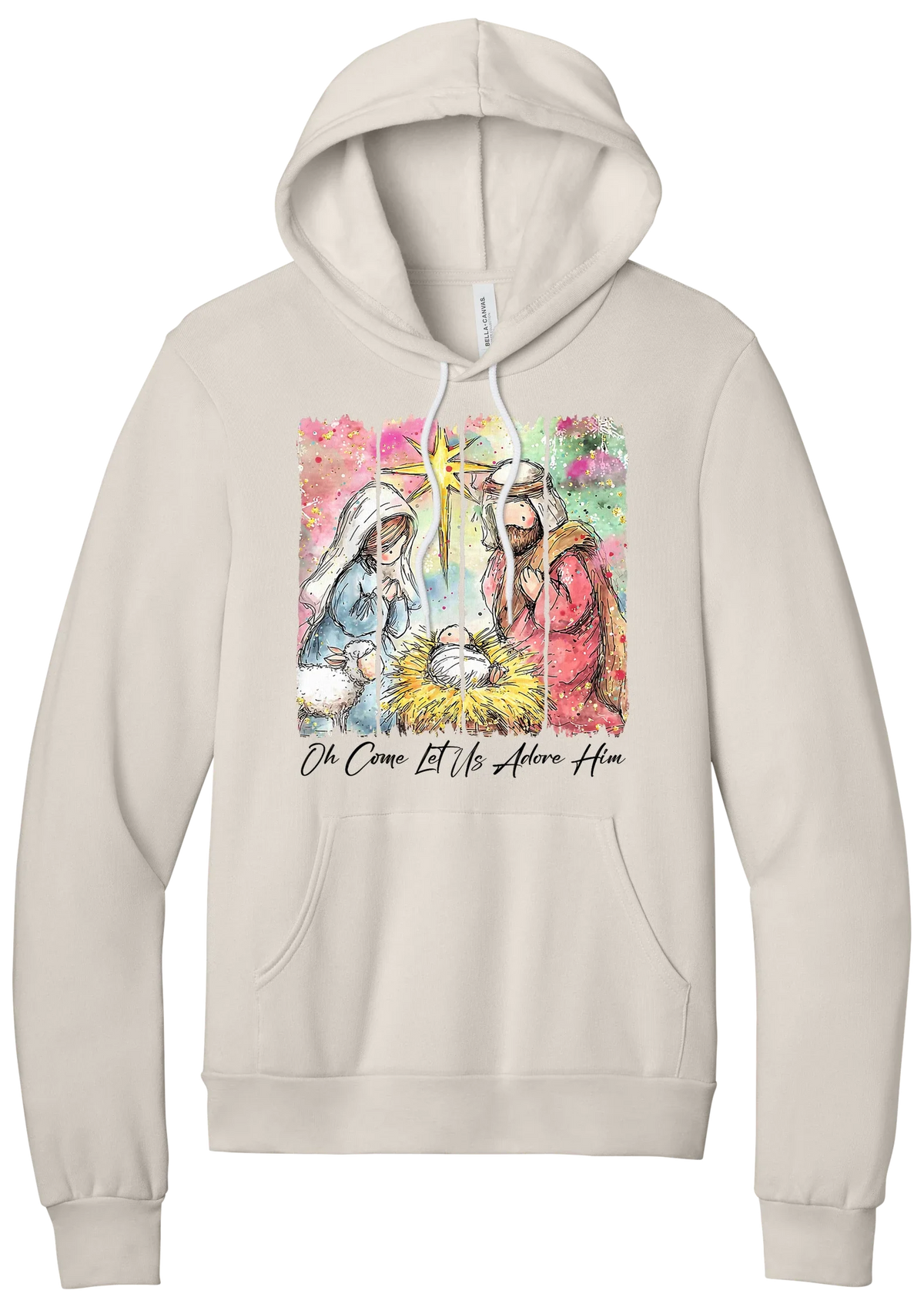 Adore Him Painted Nativity hoodie in Heather Dust, featuring a watercolor nativity of Mary, Joseph, and baby Jesus under a star with Oh Come Let Us Adore Him script