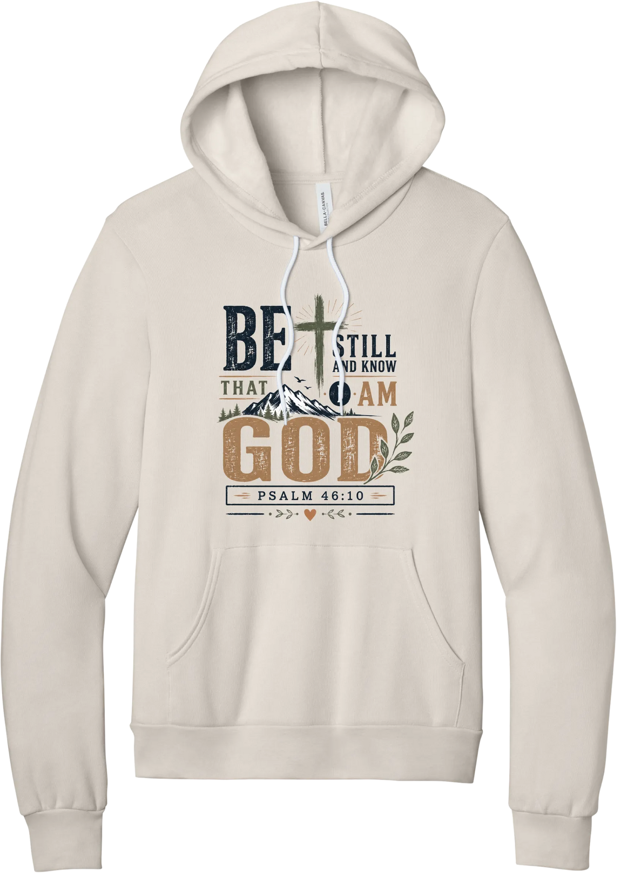 Be Still and Know hoodie in Heather Dust, featuring Be Still and Know That I Am God lettering with a cross over mountains and Psalm 46:10