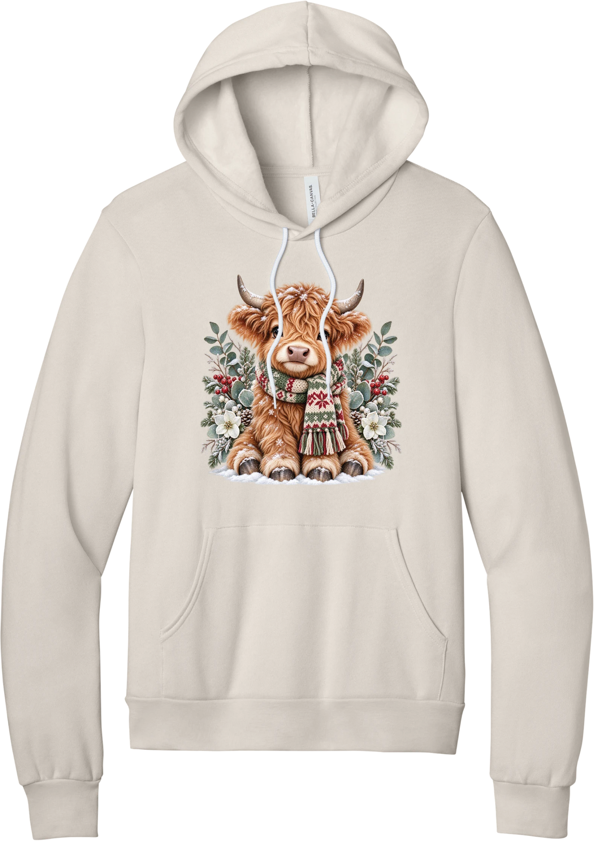 Highland Holidays hoodie in Heather Dust, featuring a fluffy baby Highland cow in a Fair Isle knit scarf, surrounded by frosted eucalyptus, pine, red berries, and white Christmas roses
