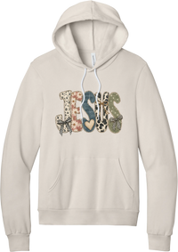 Jesus Patchwork hoodie in Heather Dust, featuring JESUS in patchwork letters of floral, leopard, denim, and cow print with gingham bows and a heart