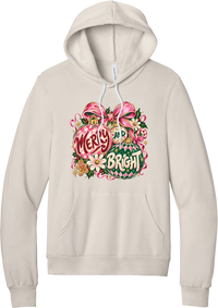 Merry and Bright Ornaments hoodie in Heather Dust, featuring hand-painted pink and green ornaments reading Merry and Bright with a pink bow, holly, daisies, a candy cane, and a gingerbread man