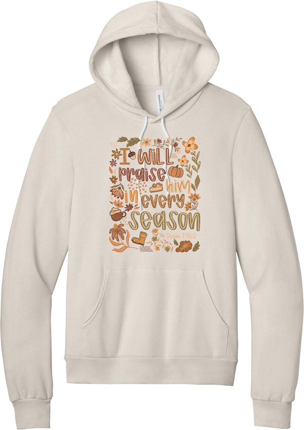 Praise Him Wildflower hoodie in Heather Dust, featuring I Will Praise Him in Every Season in hand lettering surrounded by fall wildflowers, pumpkins, a latte, boots, and Psalm 146:2