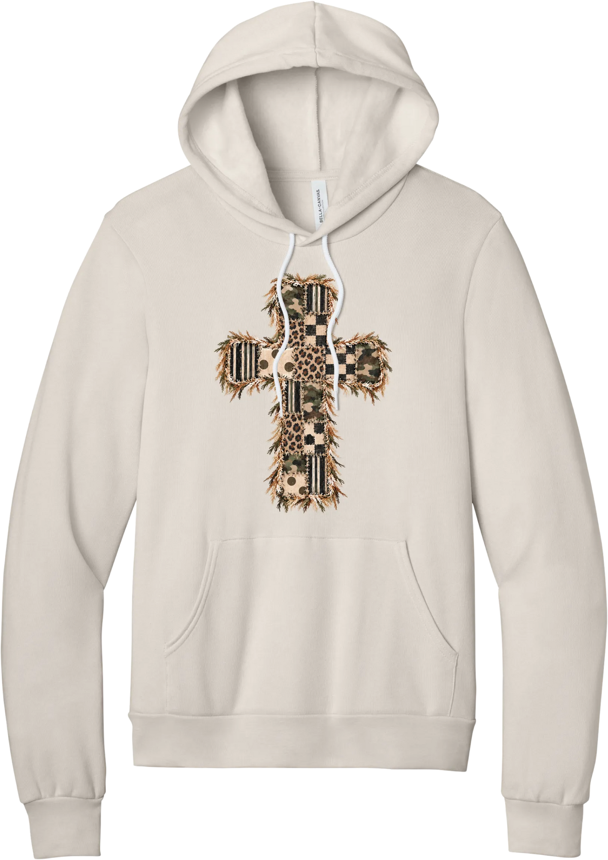 Quilted Patchwork Cross hoodie in Heather Dust, featuring a patchwork cross in camo, leopard, checkerboard, polka dot, and stripes with a fringed edge