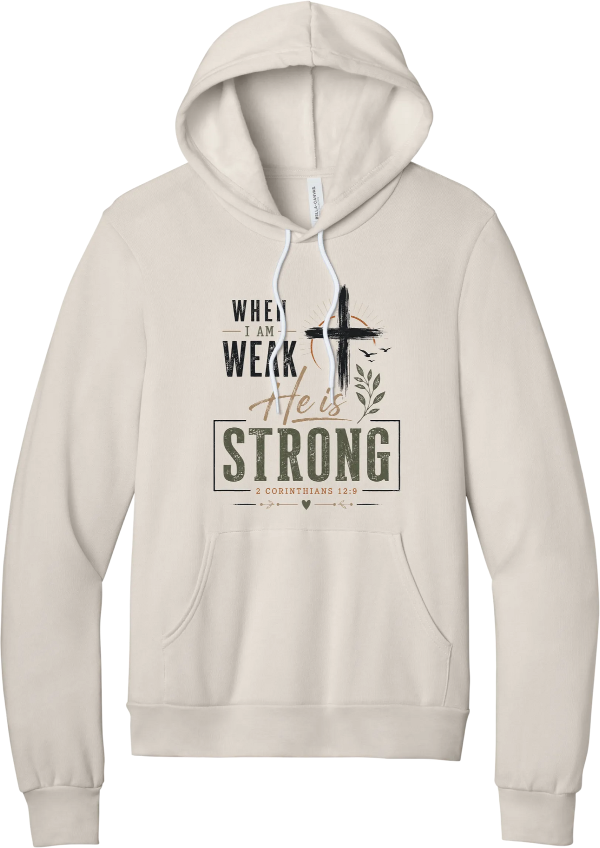 When I Am Weak hoodie in Heather Dust, featuring When I Am Weak He Is Strong lettering with a cross and 2 Corinthians 12:9