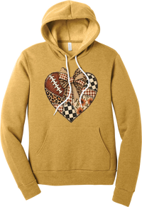 For the Love of Football hoodie in Heather Mustard, featuring a patchwork heart in leopard, plaid, and checkerboard with a football and a cream bow