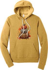 All Stacked Up hoodie in Heather Mustard, featuring three stacked pumpkins in polka dot, checkerboard, and leopard with autumn leaves