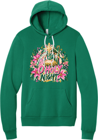 Artful O Holy Night hoodie in Kelly Green, featuring a painted nativity under the star of Bethlehem with O Holy Night lettering framed by pink poinsettias and evergreen