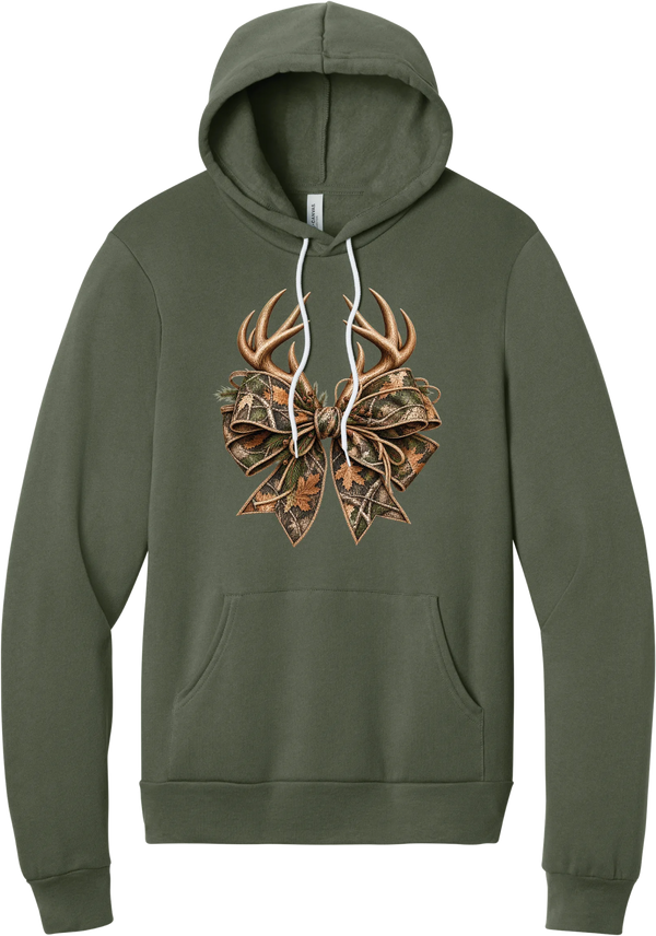 Coquette Antlers hoodie in Military Green, featuring deer antlers tied with an oversized camo bow, twine, and autumn leaves