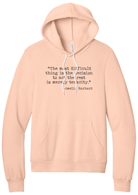 Amelia Earhart Tenacity Quote hoodie in Peach, featuring The most difficult thing is the decision to act the rest is merely tenacity in distressed black typewriter letters