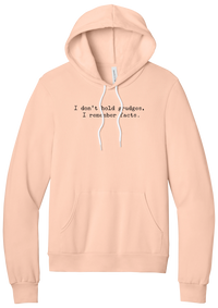 I Don't Hold Grudges hoodie in Peach, featuring I don't hold grudges, I remember facts in distressed black typewriter letters